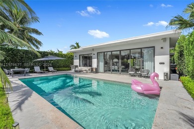 Located on the exclusive gated island of Biscayne Point, this - photo 2