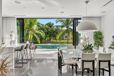 Located on the exclusive gated island of Biscayne Point, this - photo 3