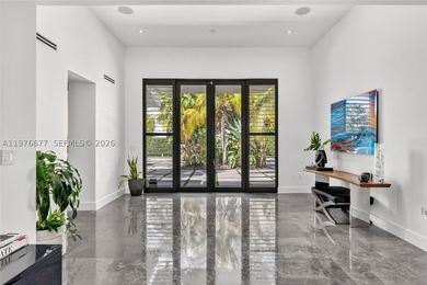 Located on the exclusive gated island of Biscayne Point, this - photo 5