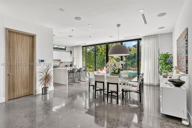 Located on the exclusive gated island of Biscayne Point, this - photo 9