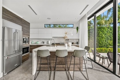 Located on the exclusive gated island of Biscayne Point, this - photo 10