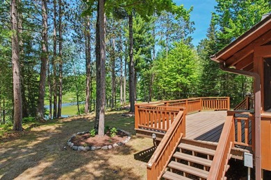 Beautifully crafted waterfront home on the Eagle River Chain - photo 15