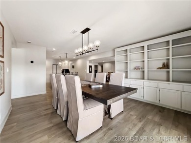 Turnkey luxury and breathtaking lakefront views await in this - photo 17