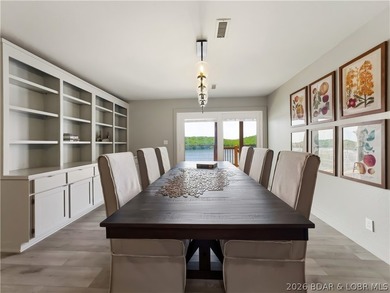 Turnkey luxury and breathtaking lakefront views await in this - photo 18