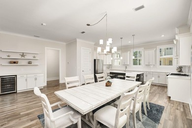 Discover coastal living at its finest in this beautifully - photo 18