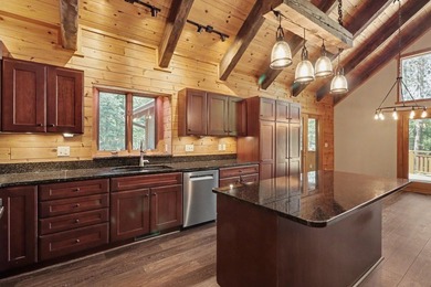 Beautifully crafted waterfront home on the Eagle River Chain - photo 18
