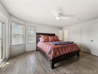 Turnkey luxury and breathtaking lakefront views await in this - photo 19