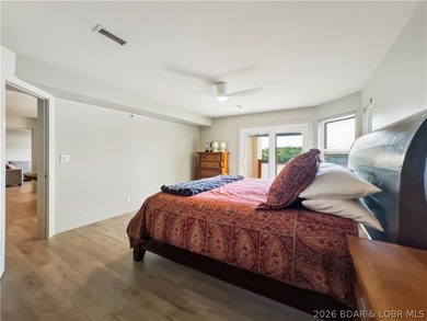 Turnkey luxury and breathtaking lakefront views await in this - photo 20