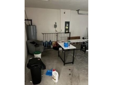 Short Sale. This single-story concrete block home offers a - photo 22