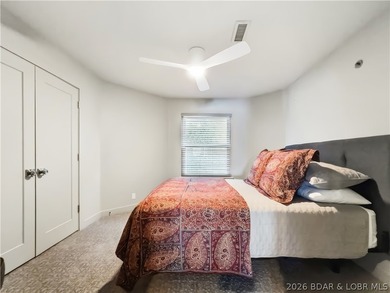 Turnkey luxury and breathtaking lakefront views await in this - photo 24