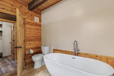 Beautifully crafted waterfront home on the Eagle River Chain - photo 24