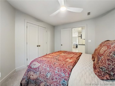 Turnkey luxury and breathtaking lakefront views await in this - photo 25