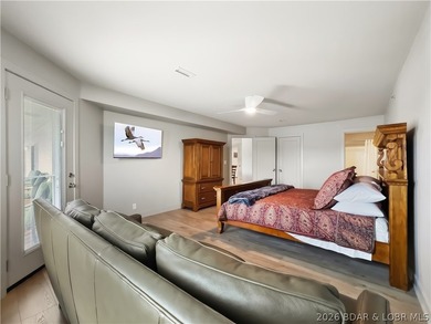 Turnkey luxury and breathtaking lakefront views await in this - photo 28
