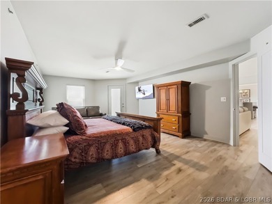 Turnkey luxury and breathtaking lakefront views await in this - photo 29