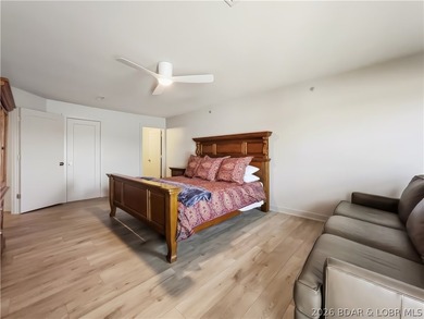 Turnkey luxury and breathtaking lakefront views await in this - photo 30