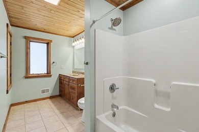 Beautifully crafted waterfront home on the Eagle River Chain - photo 31