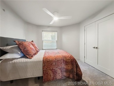Turnkey luxury and breathtaking lakefront views await in this - photo 35