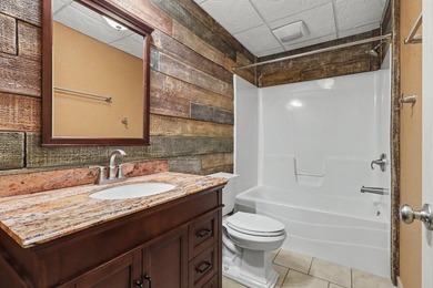 Beautifully crafted waterfront home on the Eagle River Chain - photo 36