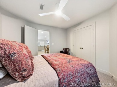 Turnkey luxury and breathtaking lakefront views await in this - photo 36