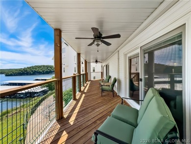 Turnkey luxury and breathtaking lakefront views await in this - photo 41