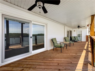 Turnkey luxury and breathtaking lakefront views await in this - photo 42