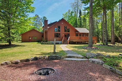 Beautifully crafted waterfront home on the Eagle River Chain - photo 42