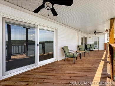 Turnkey luxury and breathtaking lakefront views await in this - photo 42