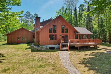 Beautifully crafted waterfront home on the Eagle River Chain - photo 43