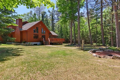 Beautifully crafted waterfront home on the Eagle River Chain - photo 47