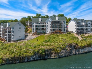 Turnkey luxury and breathtaking lakefront views await in this - photo 50