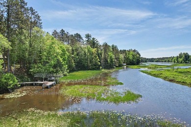 Beautifully crafted waterfront home on the Eagle River Chain - photo 50