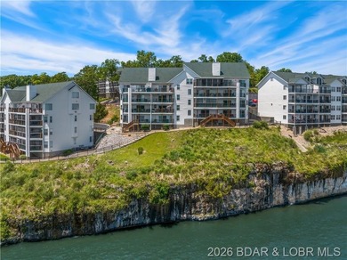 Turnkey luxury and breathtaking lakefront views await in this - photo 50