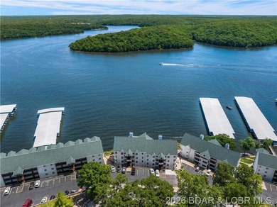 Turnkey luxury and breathtaking lakefront views await in this - photo 55