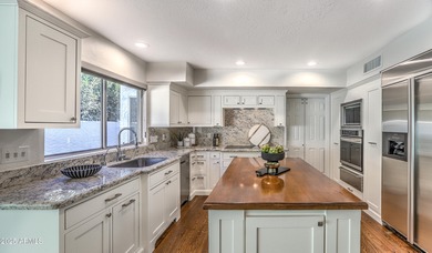 THIS HOME CAN BE PURCHASED AS A LAND-LEASE PROPERTY FOR $1,139