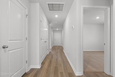 Discover the Vantage plan! This traditional three bedroom, two - photo 6