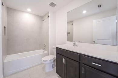 Beautiful updated 4 bedroom home in a gated community. New - photo 16