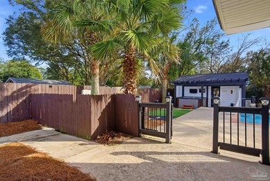 Beautifully landscaped ranch-style pool home located in the - photo 5