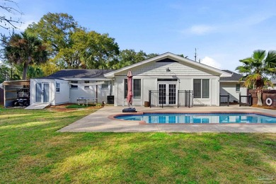 Beautifully landscaped ranch-style pool home located in the - photo 8
