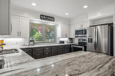 Experience the best of lake living with this beautifully updated - photo 14