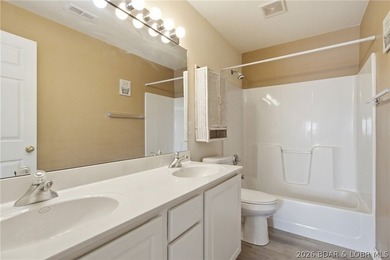 Enjoy the Lake of the Ozarks lifestyle in this beautifully - photo 15