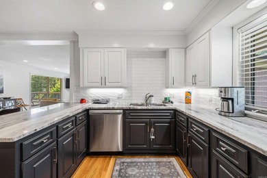 Experience the best of lake living with this beautifully updated - photo 15