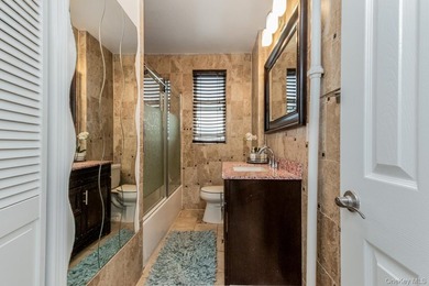 Welcome to 1858 Phelan Place in the Morris Heights section of - photo 18