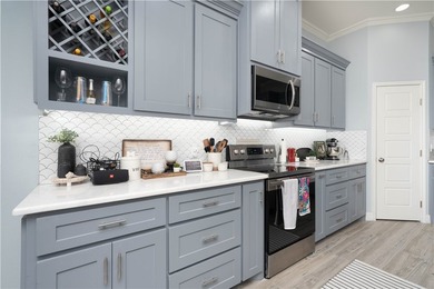 Step into modern comfort with this beautiful newer-construction - photo 9