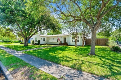 This beautifully updated 4-bedroom, 2.5-bath home offers the - photo 2