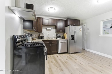 This adorable home in North Gulfport offers it all, with easy - photo 11