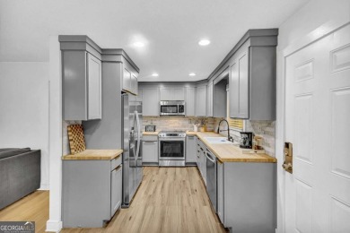 Don't miss this private retreat in the city! 3BR/2BA Mid-Century