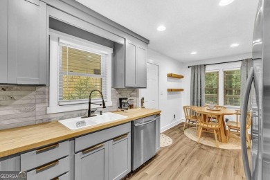 Don't miss this private retreat in the city! 3BR/2BA Mid-Century