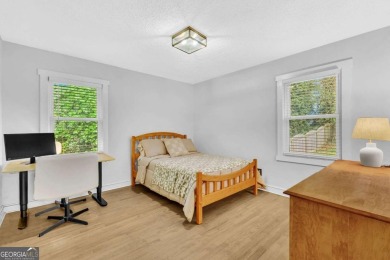 Don't miss this private retreat in the city! 3BR/2BA Mid-Century