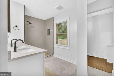 Don't miss this private retreat in the city! 3BR/2BA Mid-Century