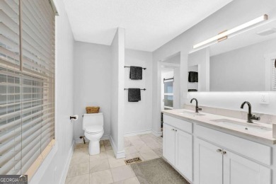 Don't miss this private retreat in the city! 3BR/2BA Mid-Century